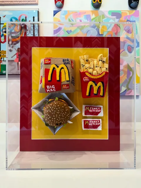 Lucy Sparrow, McFelt Meal, in a Frame Chicago frame.